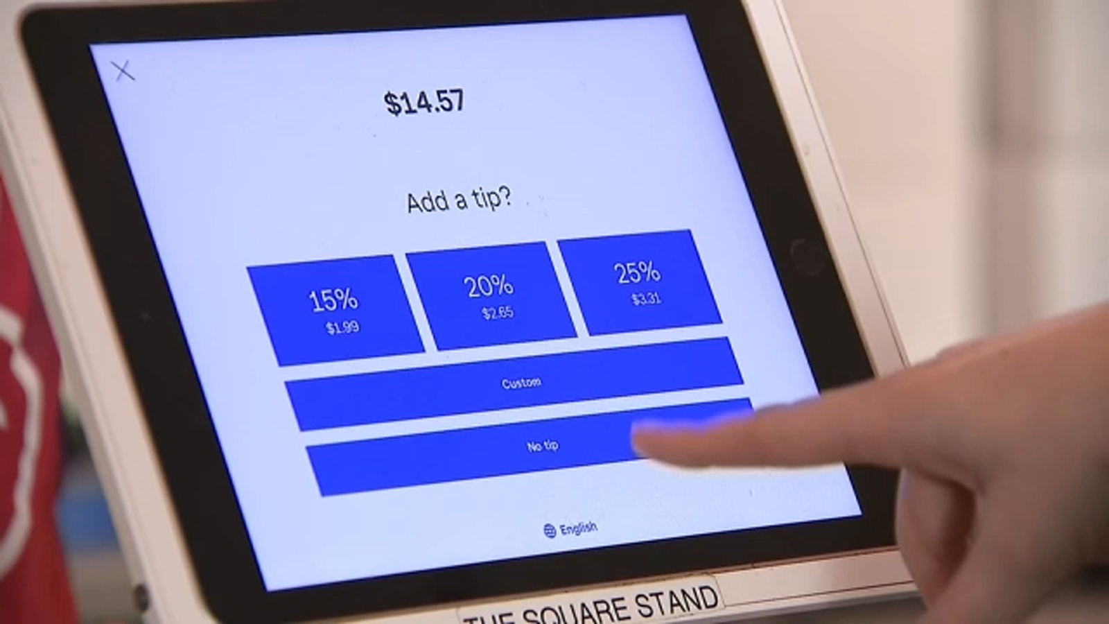 Restaurant staff using digital devices to fill out forms